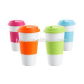 140Z ceramic promotional mug with spill-proof silicone lid band